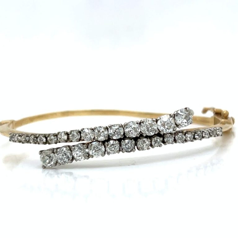 14K Yellow Gold 3.20 Ct. Diamond Bangle: Item # 12397 Category Bracelets 14K Yellow Gold 3.20 Ct. Diamond Bangle Weighing 13.4 grams Set with 30 Old Mine Diamonds weighing app. 3.20 Ct. G-I Color, VS1-Si1 Clarity Fits 6 inch wrist
