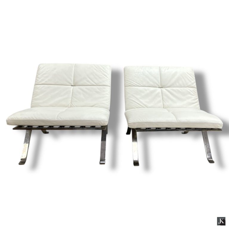 Pair Poltrona Frau Brooklyn Chairs: Pair Poltrona Frau Brooklyn Chairs. Comprised of leather and chrome. Made in Italy. Original label. Good condition. Measures 25" H x 27" W x 19-1/2" D. Retail $1200 each.