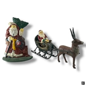 2 Vintage Cast Iron Santas
