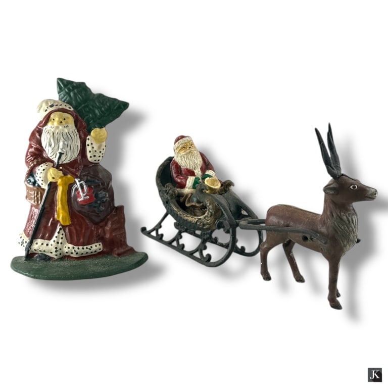 2 Vintage Cast Iron Santas: 2 Vintage Cast Iron Santas. One a doorstop 9-1/2" H, the other Santa in Sleigh with Reindeer 7-1/2" H x 13-1/2" L. Break to deer rein or in good condition consistent with age and use. LA/B13/SH:5A