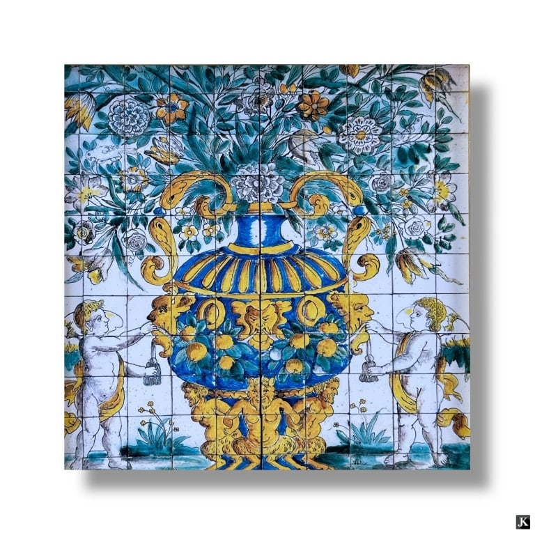 Faux Decorative Tile in Wood Frame: Faux Decorative Tile in Wood Frame Unsigned decorative tile set in a wood frame. Shows some wear and scuffs to the frame, otherwise in good condition.Measures 17" H x 17" W overall including frame.Key