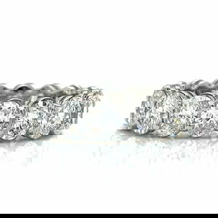 Platinum 6.90 Ct. Diamond Eternity Band: Item # 9812 Category Rings Platinum 6.90 Ct. Diamond Eternity Band Weighing 7.7 grams Set with 15 Oval Diamonds weighing app. 6.90 Ct. F-G Color, VVS-VS Clarity Ring Size 6.5