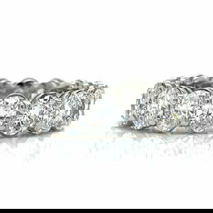 Platinum 9.00 Ct. Diamond Eternity Band: Item # 9772. Category Rings Platinum 9.00 Ct. Diamond Eternity Band Weighing 9.0 grams Set with 14 Oval shaped Diamonds weighing ap. 9.00 Ct. F-H Color, VVS-VS Clarity Ring Size 6.5
