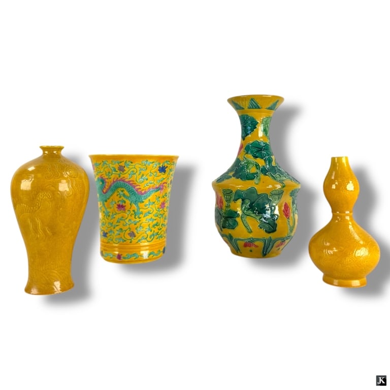 4 Chinese Yellow Glaze Porcelain Vases: 4 Chinese Yellow Glaze Porcelain Vases. Signed with various marks. Includes 2 small etched vases 5-1/4" H, 5-3/4", 1 dragon motif 5-1/4", 1 with lotus motif 8-3/4". All pieces in good condition. LA/B1