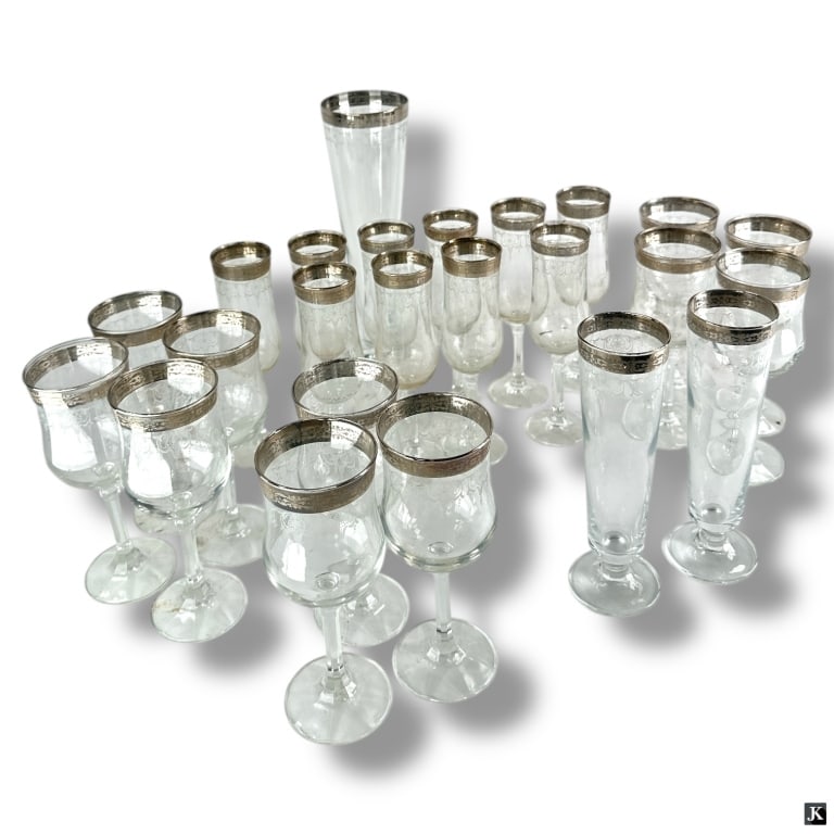 24 Vintage Etched Stemware with Silver Rims: 24 Vintage Etched Stemware with Silver Rims. Includes: 11 wine glasses, 7-3/8"; 10 wine, 8"; 2 flutes, 8-1/4"; 1 tall beer glass, 11-1/4". Unsigned. Good condition with no chips or cracks. Keywords: v