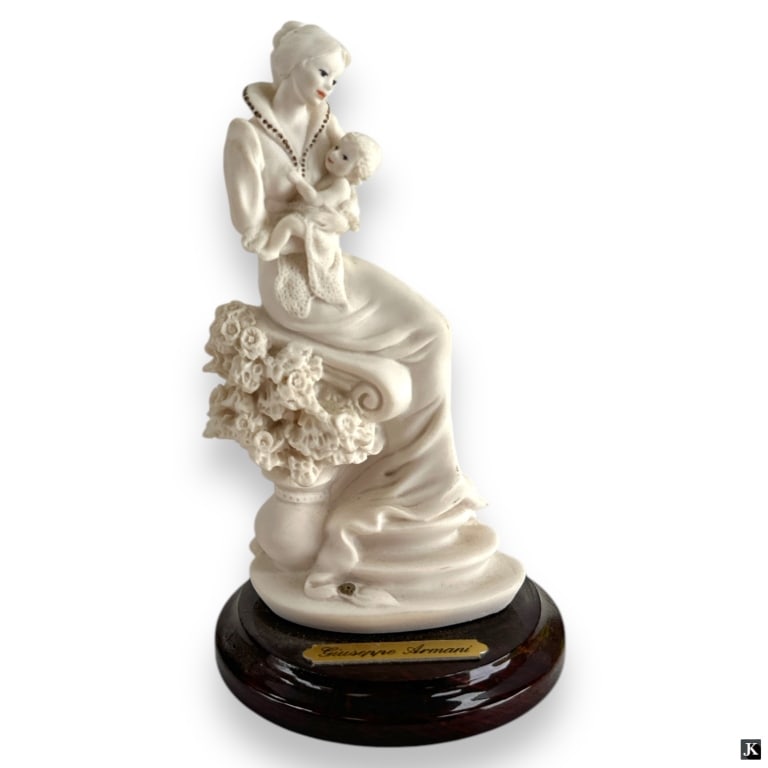 Giuseppe Armani - MATERNITY WITH FLOWERS – 0939F: Sculpture by Giuseppe Armani, titled “MATERNITY WITH FLOWERS”, Reference # 0939F. Figurine is in perfect condition, "F" Finish, attached to wooden base. Impress artist signature. Marked made i