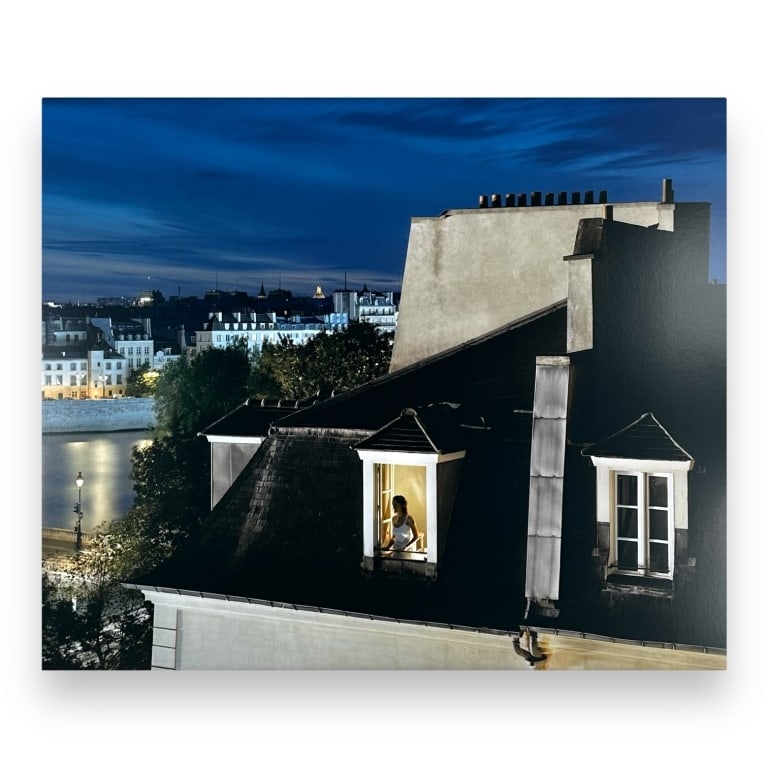 Kevin Cooley (USA B1975) Chromogenic Print Of City: Kevin Cooley (AMERICAN / LOS ANGELES, Born 1975) chromogenic print depicting a city rooftop scene with a woman at the window. Probably signed and numbered to verso. KEYWORDS: Kevin Cooley, Chromogenic