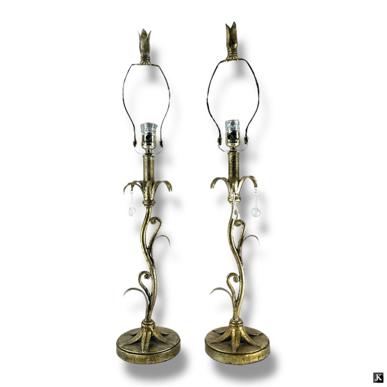 Pair Hollywood Regency Style Foliate Lamps: Pair Hollywood Regency Style Foliate Lamps. Unsigned. Some prisms missing or in good condition. Harps and finials included. Measures 19-3/4" x 5-3/4". Keywords: Hollywood Regency, foliate lamps, decor