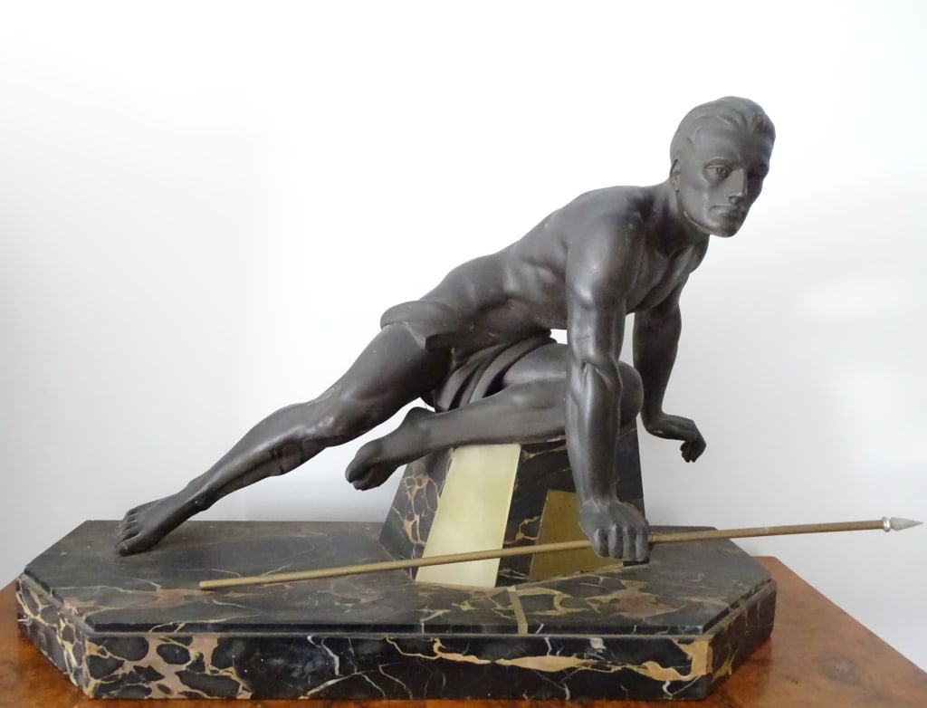 Jean De Roncourt Spelter Sculpture "Hunter": Jean De Roncourt Spelter Sculpture titled "Hunter". No visible marks. Minor signs of age, in good condition. Measures (including base) approx. 16 3/4", 24 1/2" L and depth of 8.5". B17