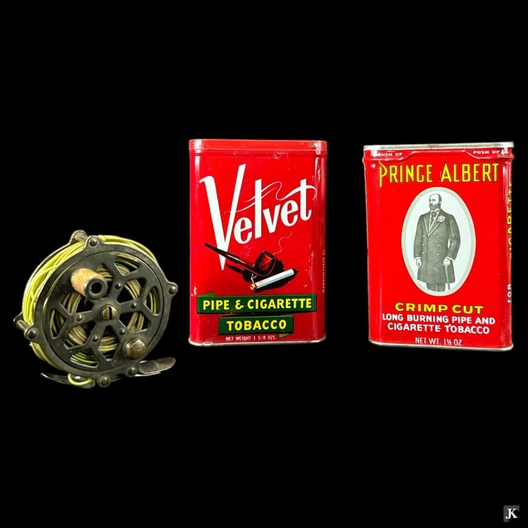 Antique Wooden Handle Fishing Reel & Tobacco Cans: Antique wooden handle fishing reel and 2 vintage tobacco cans by Velvet and Prince Albert.. No apparent branding. Fishing reel measures approx. 2 3/4" diameter. Bend on reel foot. Tobacco cans appear