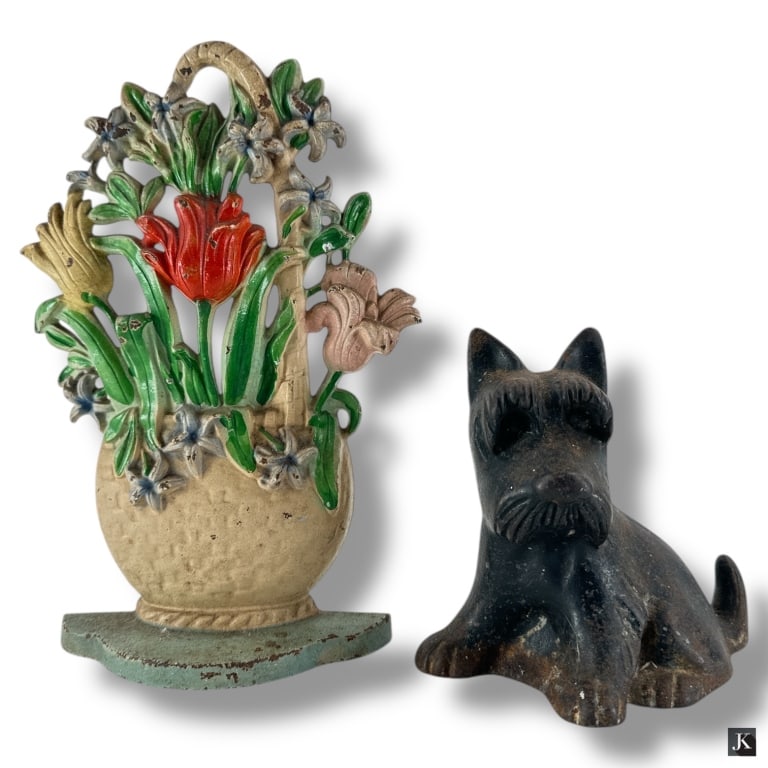 2 Vintage Cast Iron Doorstops - Scotty, Floral: Vintage Cast Iron Santa and Floral Doorstop. Unmarked. The paint appears original and in overall good condition consistent with age and use. Measures 5-1/4" H, 9-1/2" H. LA/B13/SH:6A