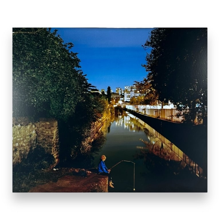 Kevin Cooley (USA B1975) Chromogenic Print Of Cana: Kevin Cooley (AMERICAN / LOS ANGELES, Born 1975) chromogenic print depicting a canal with fisherman. Probably signed and numbered to verso. Mounted in a black lacquer wooden frame. Paper measures appr