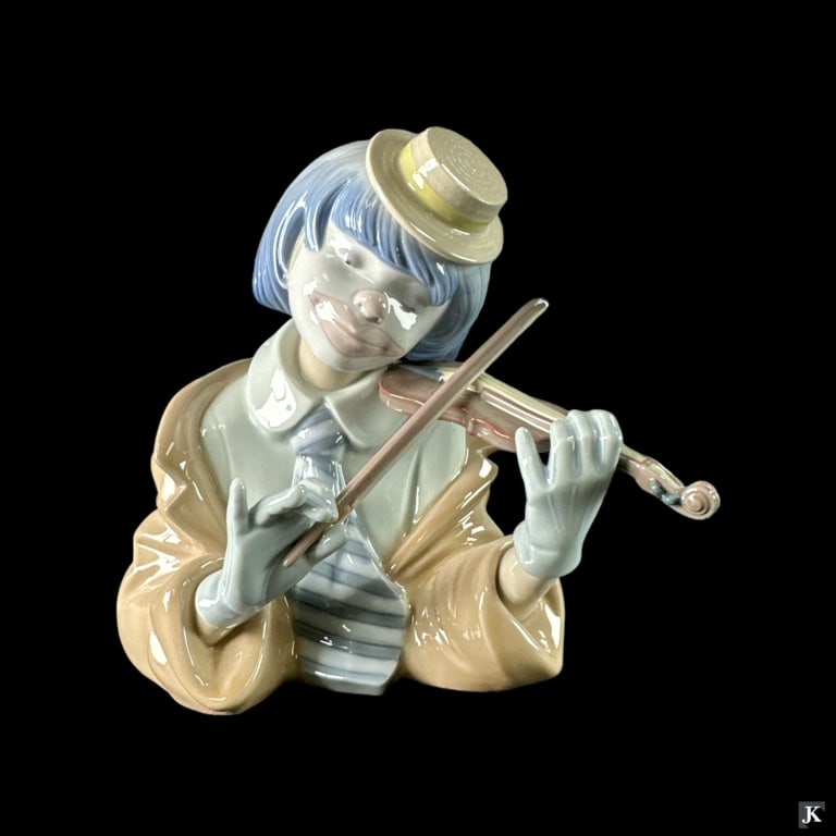Lladro Spain "The Blues" Porcelain Figure #5600: Lladro Spanish glazed porcelain sculpture titled "The Blue" or "Busto Payasito Violinista" number 5600. Sculpted by Francisco Catalá. Issued in 1989 and retired in 1993. Measures approx. 6" height. I