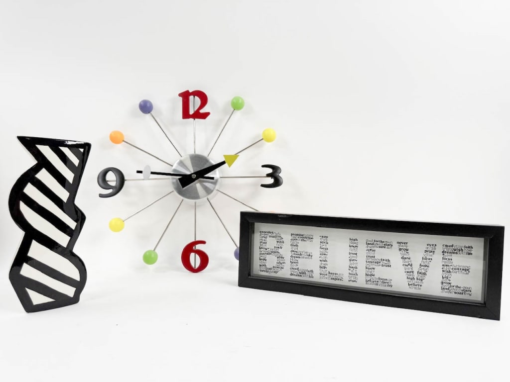 3 Contemporary Home Decor Objects: 3 Contemporary Home Decor Objects. Lot includes: Mikasa ceramic vase, signed, good condition, 9-1/2" H; wall clock, battery operated, good condition, 14-1/2" x 14-1/2"; "Believe" wall decor, good cond