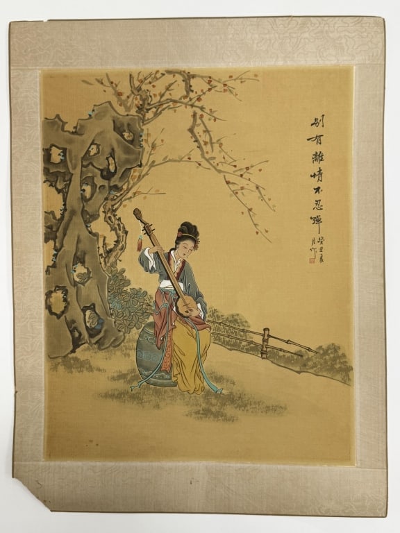 Artist Unknown Chinese Print On Silk: Artist unknown Chinese print on silk "Woman Playing Lute". Writing and seal printed upper right. Backed on paper and bordered with decorative silk. Damage on left corner and top right of border and mi