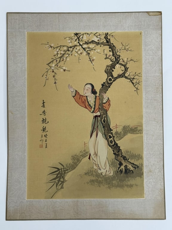 Artist Unknown Chinese Print On Silk: Artist unknown Chinese print on silk "Woman at the Tree". Signature printed center left. Backed by paper and bordered with decorative silk. Minor wear and blemishes along the edges of the border and m