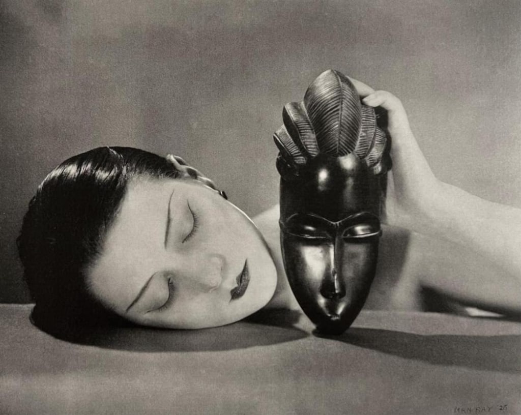 Man Ray (1890-1976) Photogravure: Man Ray, American (1890-1976) photogravure "Noire et Blanche". 'MAN RAY '26' printed lower right. Matted and backed by board. In good condition. Image measures (sight) 6 1/2" x 8 1/4" Board measures 1