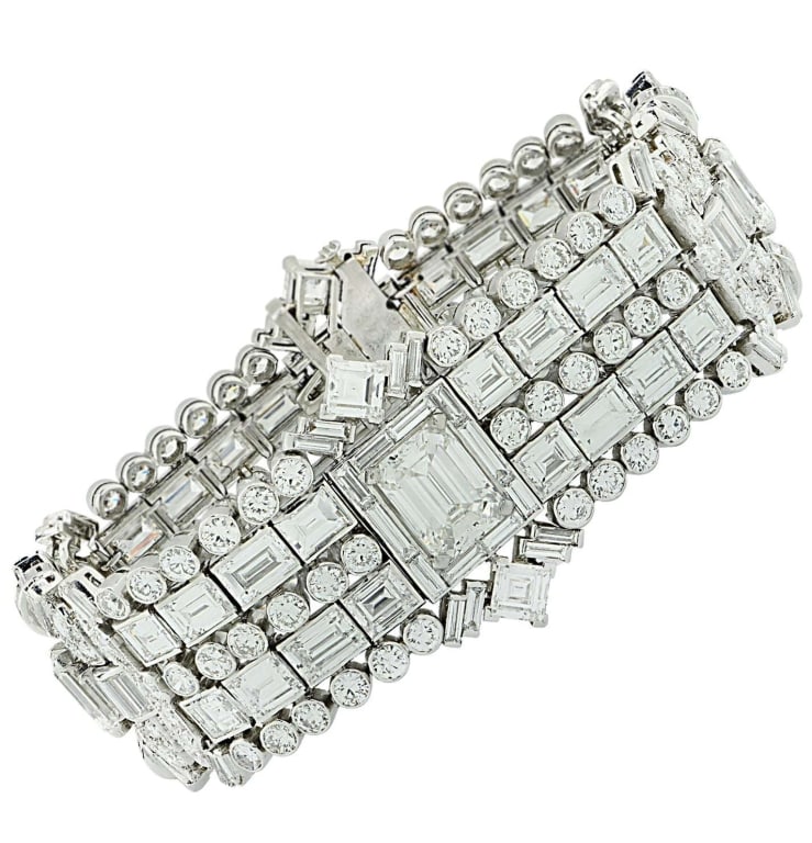 Art Deco 50Ct Diamond Bracelet in Platinum with GI: This Art Deco 50ct Diamond Bracelet in Platinum (V45278) is a stunning tribute to the elegance and sophistication of the Jazz Age. Crafted with precision and artistry, it showcases a dazzling array of