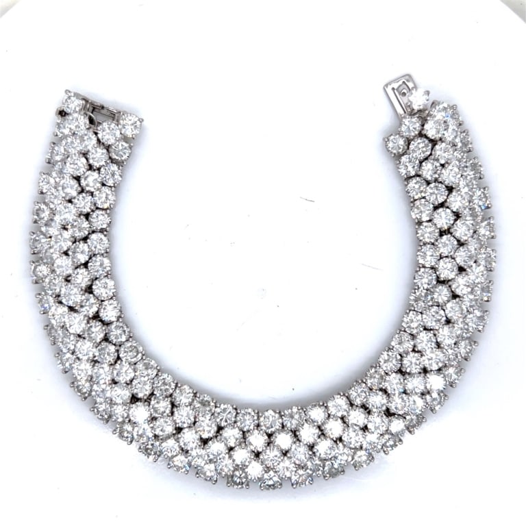 Platinum 55.50 Ct. Diamond Bracelet: Item # 13178 Category Bracelets Platinum 55.50 Ct. Diamond Bracelet Weighing 70.9 grams Set with 170 Diamonds weighing app. 55.50 Ct. D-F Color, VVS-VS Clarity 7 inches in length
