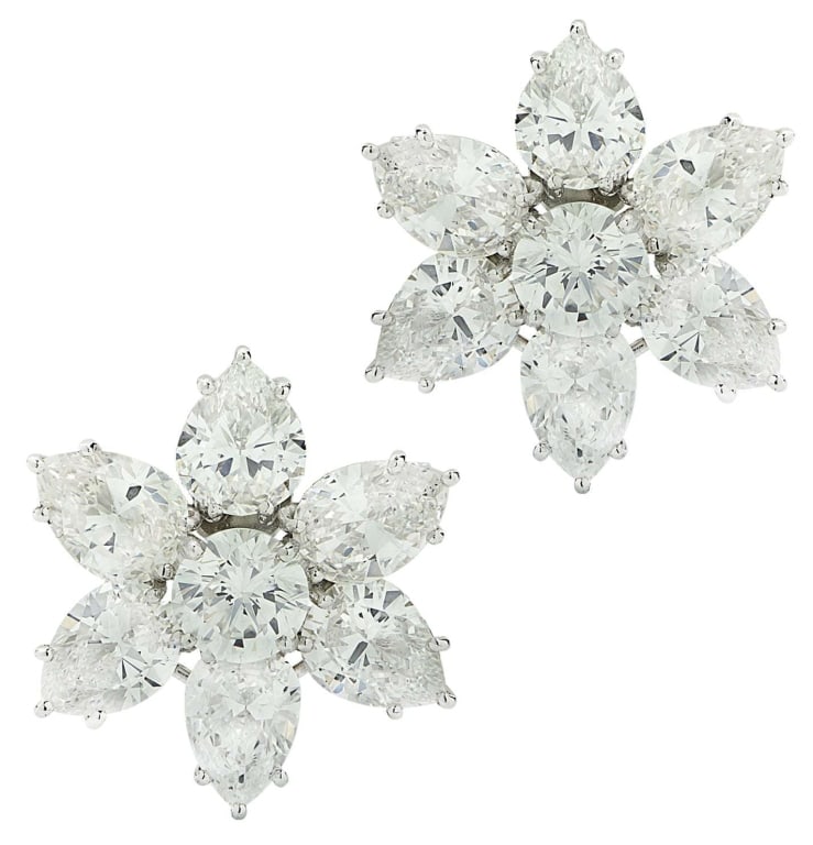 GIA Certified 12Ct Vivid Diamond Cluster Earrings: Experience unparalleled luxury with the Vivid Diamond GIA Certified 12 Carat Diamond Cluster Earrings. Crafted with meticulous attention to detail, these exquisite earrings feature a stunning combinat
