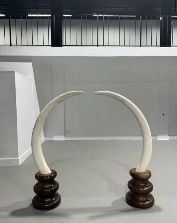 Pair of Chinese Carved Tusk: Pair of Chinese Carved Tusk. Wooden Bases. 64 inches high x 13 inches diameter.