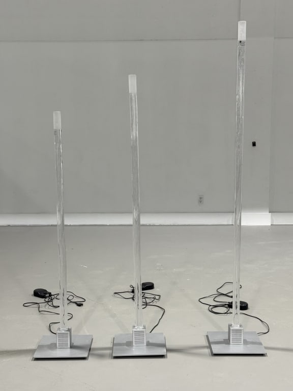 (3) Three Reflex Lucciola Floor Lamps: (3) Three Reflex Lucciola Floor Lamps. Largest Measures 75 inches high, Smallest 57 inches high