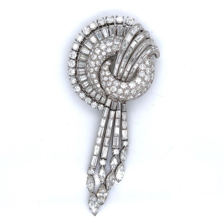 Art Deco Platinum 27.70 Ct. Diamond Brooch: Item # 13102 Category Pins - Clips Art Deco Platinum 27.70 Ct. Diamond Brooch Weighing 35.2 grams Set with 8 Marquise Diamonds weighing app. 4.50 Ct. Along with 88 European-cut Diamonds weighing app.