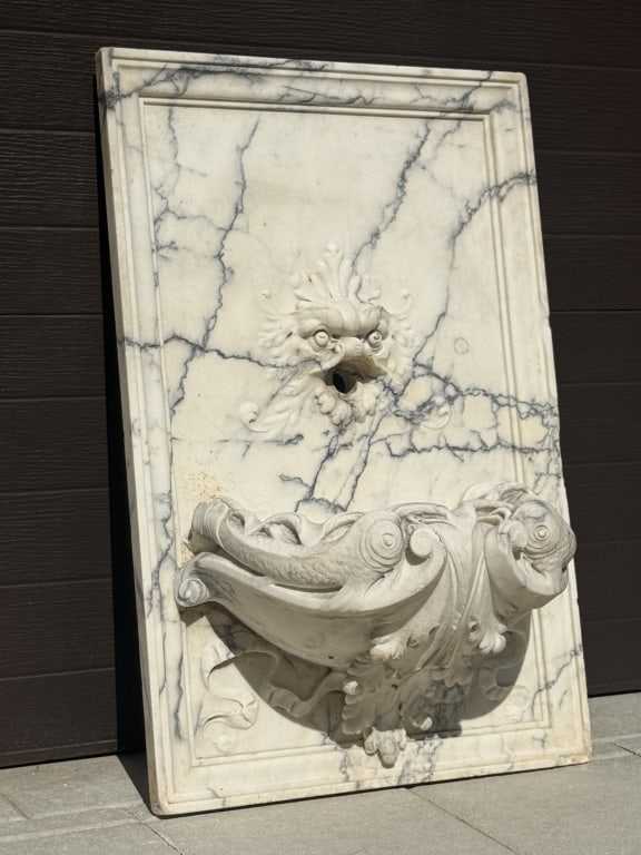 Fantastic Italian Carrara Marble Wall Fountain: Italian Carved Carrara Marble Wall Fountain possibly 18th century Carved marble, grey veins with dolphin or fish motifs flanking central element. Measures 31 1/2 inches high x 20 1/2 inches wide.