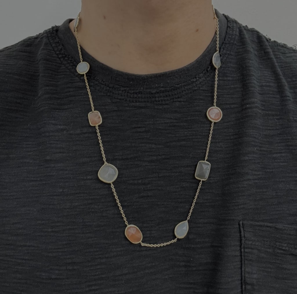 Vintage .925 Sterling Silver Gemstone Necklace: Vintage gold colored .925 sterling silver gemstone necklace. Stamped 'India' and 'UTC 925' on either side next to clasp. Some signs of wear present, otherwise in good condition.