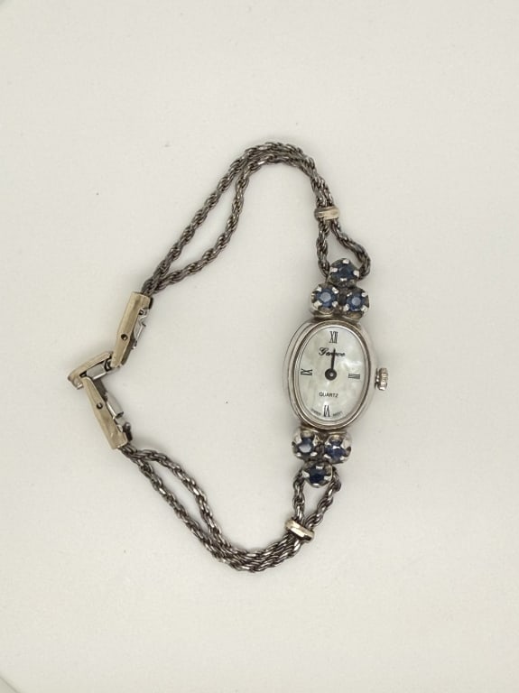 Vintage Geneve .925 Chain Bracelet Swiss Watch: Vintage women's Geneve .925 sterling silver chain bracelet quartz Swiss movement watch with gemstone decoration. Stamped on back and clasps. Back and clasps are stainless steel, bracelet and case are