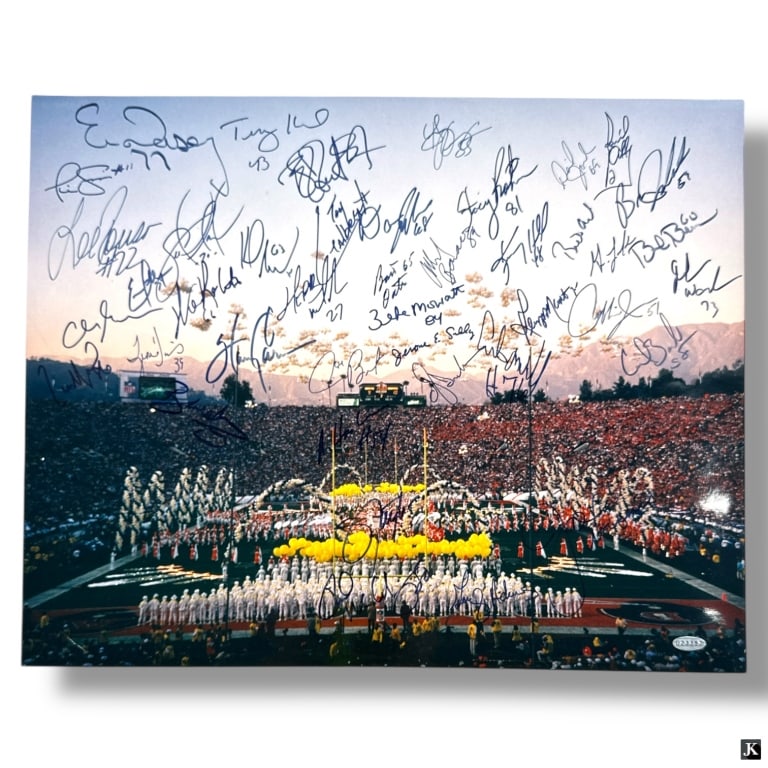 Signed Denver Broncos Color Photograph: Signed Denver Broncos Color Photograph. Autographed by the players. Good condition. Measures 16" x 20". LA/B13/SH:14A