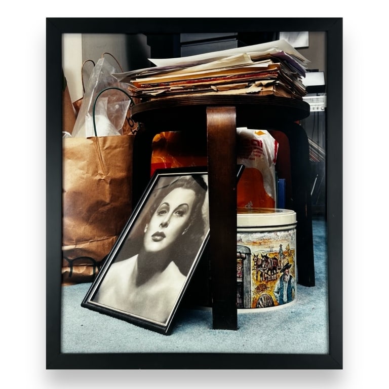 Michelle Cheiken (USA 20th/21st) Chromogenic Print: Michelle Cheiken (AMERICAN, 20th/21st Century) chromogenic print depicting a scene with portrait of Marylin Monroe and stool with folders and papers stacked atop. No apparent signature, possibly