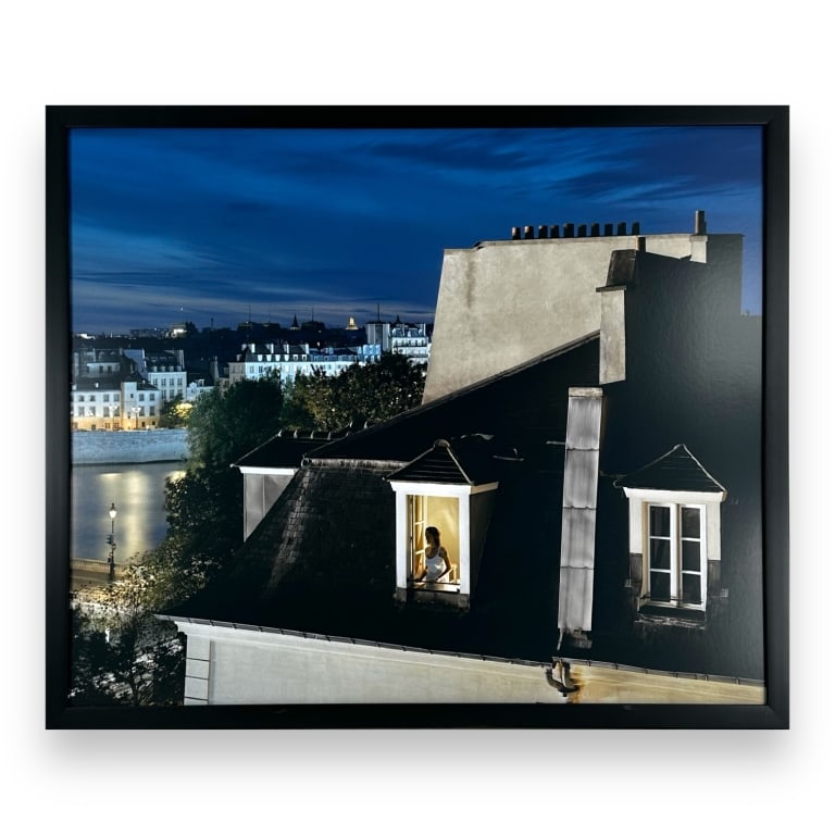 Kevin Cooley (USA B1975) Chromogenic Print Of City: Kevin Cooley (AMERICAN / LOS ANGELES, Born 1975) chromogenic print depicting a city rooftop scene with a woman at the window. Probably signed and numbered to verso. KEYWORDS: Kevin Cooley,
