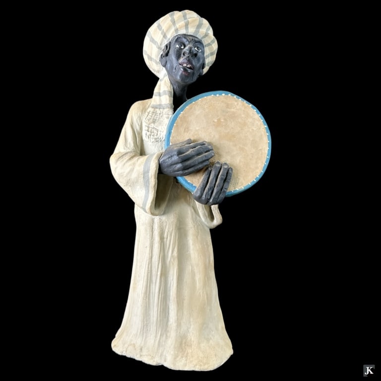 Vtg Heavy Pottery Orientalist Merchant Sculpture: A vintage heavy hand crafted pottery Orientalist sculpture depicting an Arab merchant. No apparent signature. Measures approx. 14 3/8" height. Appears in overall good condition for age. JD/B13/SH:20A