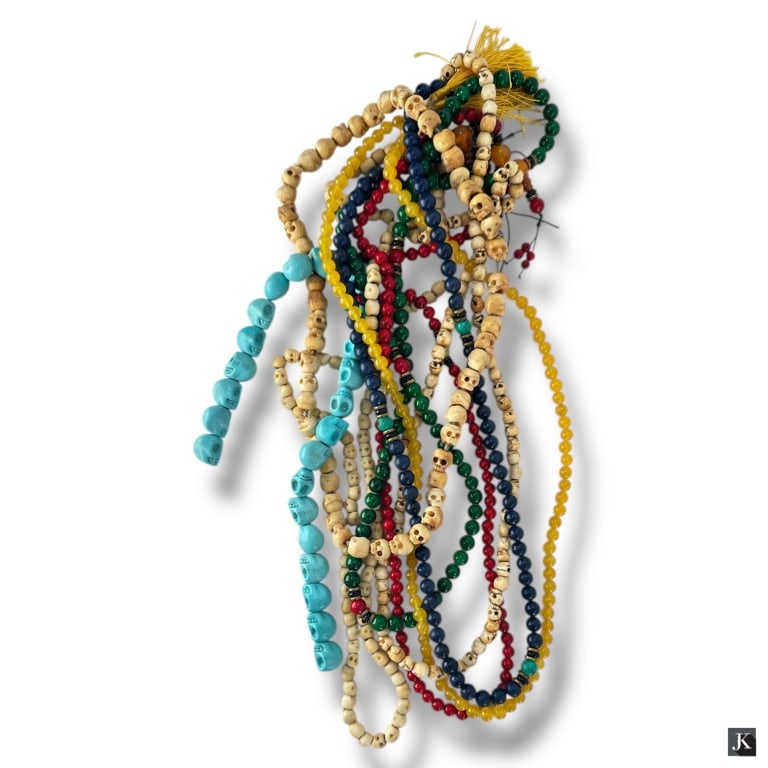 Collection of Tibetan Mala Prayer Beads: Collection of 8 Tibetan Mala Prayer Beads. Includes carved bone skull mala, turquoise skull mala, red, green, blue and yellow beads. LA/B13/SH:10A