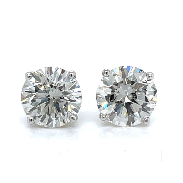 14K White Gold GIA Certified 5.43 Ct. Diamond Stud: Item # 13281 Category Earrings 14K White Gold GIA Certified 5.43 Ct. Diamond Stud Earrings Weighing 3.2 grams Set with a GIA Certified 2.75 Ct. Diamond K Color, SI1 Clarity (GIA eReport only) Along wi