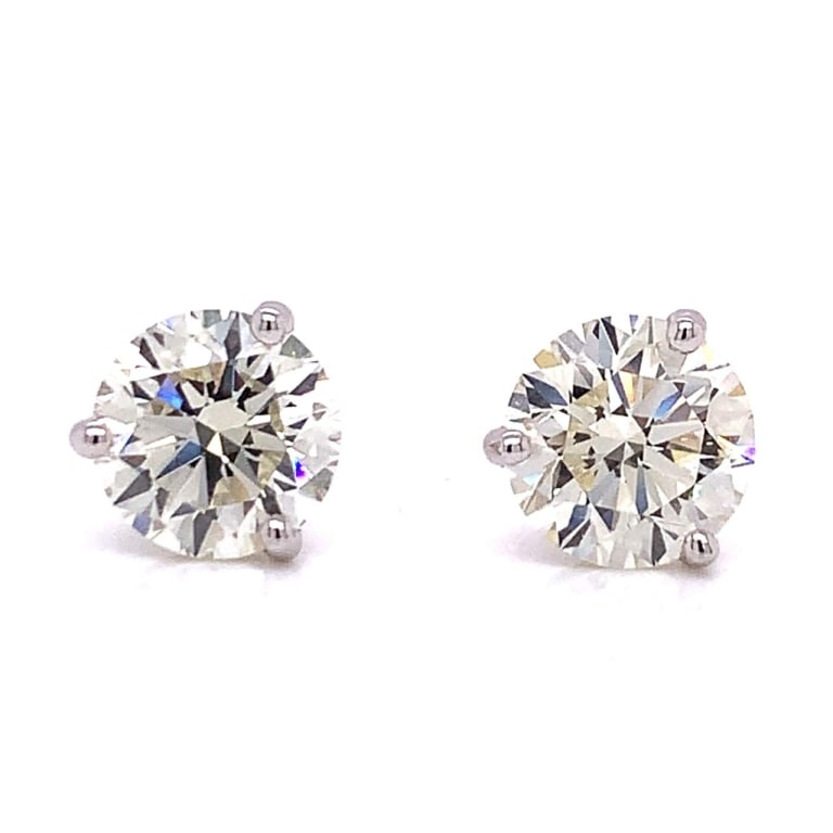 GIA Certified 4.00 Ct. Diamond Stud Earrings: Item # 6992 Category Earrings 14k White Gold GIA Certified 4.00 Ct. Diamond Stud Earrings Weighing 2.5 grams Set with a GIA Certified Round Brilliant Diamond weighing 2.00 Ct. M Color, VVS2 Clarity