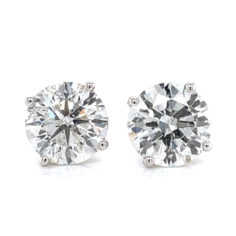 14K White Gold 5.43 Ct. Diamond Stud Earrings: Item # 12161 Category Earrings 14K White Gold 5.43 Ct. Diamond Stud Earrings Weighing 3.2 grams Set with a 2.85 Ct. and a 2.58 Ct. Diamond H-I Color, Si2-I1 Clarity Studs