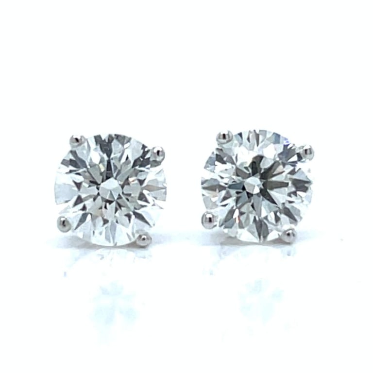 14K White Gold GIA Certified 2.06 Ct. Diamond Stud: Item # 12591 Category Earrings 14K White Gold GIA Certified 2.06 Ct. Diamond Stud Earrings Weighing 1.7 grams Set with a GIA Certified 1.02 Ct. Diamond I Color, VS2 Clarity Along with 1.04 Ct. Diamond