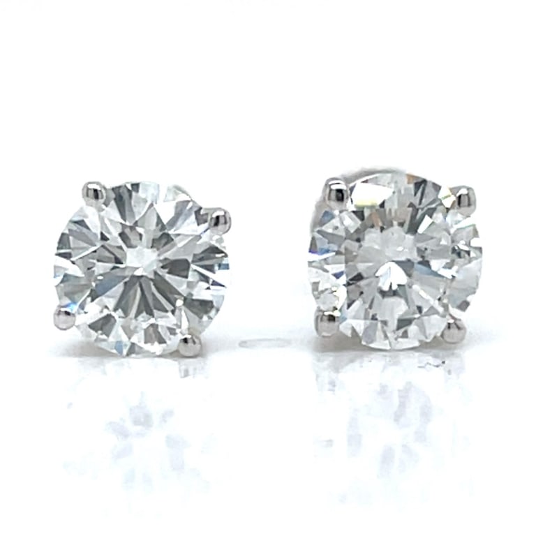 14K White Gold GIA Certified 2.03 Ct. Diamond Stud: Item # 13503 Category Earrings 14K White Gold GIA Certified 2.03 Ct. Diamond Stud Earrings Weighing 1.7 grams Set with: 1.02 Ct. GIA Certified Round Diamond H Color SI1 Clarity 1.01 Ct. GIA Certified