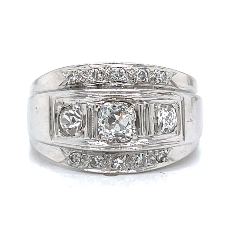 1960’s 18K White Gold 1.85 Ct. Men’s Diamond Ring: Item # 13169 Category Rings 1960’s 18K White Gold 1.85 Ct. Men’s Diamond Ring Weighing 13.6 grams Set with an app. 0.75 Ct. Old Cushion-cut Diamond Along with 12 Diamonds weighing app. 1.1