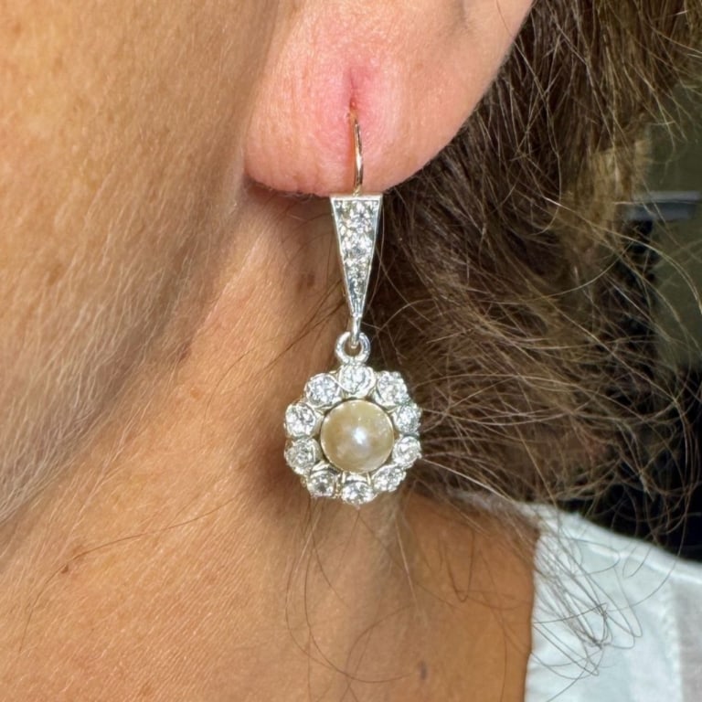 Art Deco Platinum & 18K Pearl and Diamond Earrings: Item # 13165 Category Earrings Art Deco Platinum & 18K Pearl and Diamond Earrings Weighing 4.9 grams Set with 26 Old Mine Diamonds weighing app. 2.20 Ct. F-H Color, VS2-SI1 Clarity Along with 2 Pearls