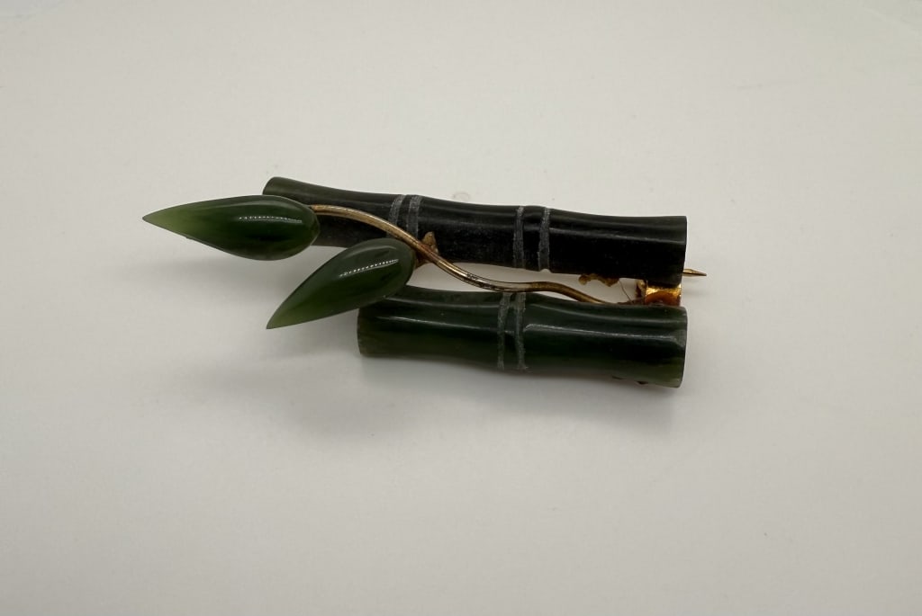 Vintage Bamboo Gemstone Gold Toned Brooch: Vintage bamboo gemstone gold toned brooch. No make or stamps. Some tarnishing and signs of age/use, otherwise in good condition.