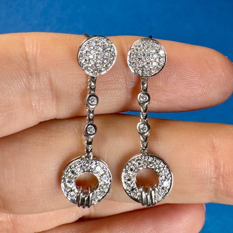 DIMIDOLO 18K White Gold 1.50 Ct. Diamond Earrings: Item # 13085 Category Earrings DIMIDOLO 18K White Gold 1.50 Ct. Diamond Earrings Weighing 5.1 grams Set with 60 Diamonds weighing app. 1.50 Ct. F-G Color, VVS-VS Clarity 1.25 inches in length