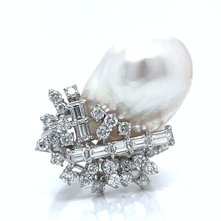 1960’s 14K White Gold South Sea Pearl & Diamond Ri: Item # 12629 Category Rings 1960’s 14K White Gold South Sea Pearl & Diamond Ring Weighing 12.4 grams Set with a South Sea Pearl measuring 21.0 x 14.8mm Along with 26 Diamonds weighing app. 1.00
