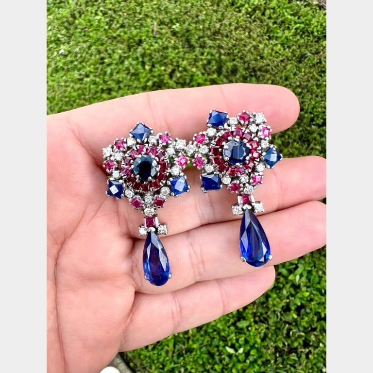 1950’s Platinum Diamond, Ruby, & Sapphire Earrings: Item # 11977 Category Earrings 1950’s Platinum Diamond, Ruby, & Sapphire Earrings Weighing 35.1 grams Set with 28 Diamonds weighing app. 1.20 Ct. H-I Color, VS1-SI1 Clarity Along with 46 Rubies