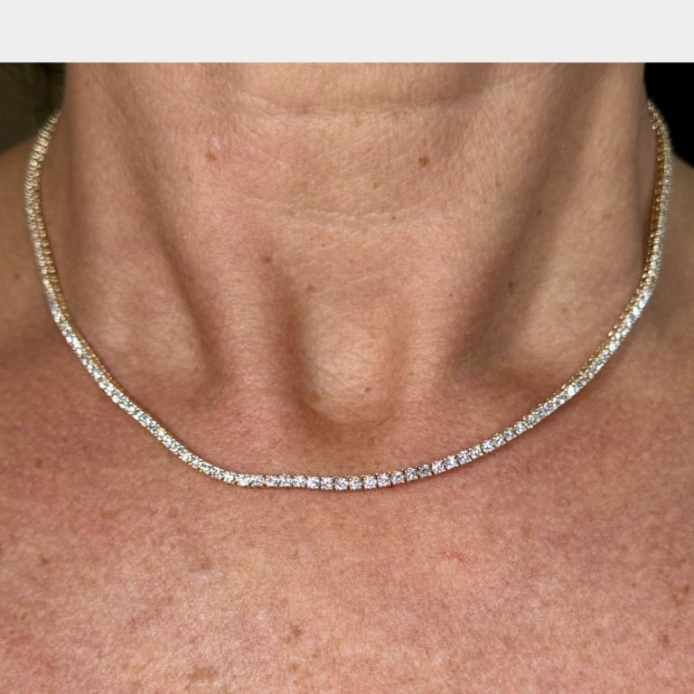 14K Yellow Gold 5.80 Ct. Diamond Tennis Necklace: Item # 11770 Category Necklaces 14K Yellow Gold 5.80 Ct. Diamond Tennis Necklace Weighing 11.4 grams Set with 182 Diamonds weighing app. 5.80 Ct. G-H Color, VS1-VS2 Clarity 16 inches in length