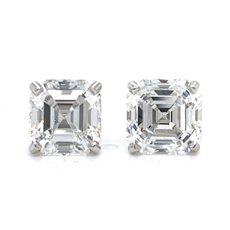 14K White Gold GIA Certified 3.27 Ct. & 2.68 Ct. D: Item # 9734 Category Earrings 14K White Gold GIA Certified 3.27 Ct. & 2.68 Ct. Diamond Stud Earrings Weighing 3.2 grams Set with a GIA Certified 3.27 Ct. Ascher-cut Diamond E Color, VVS2 Clarity 8.19