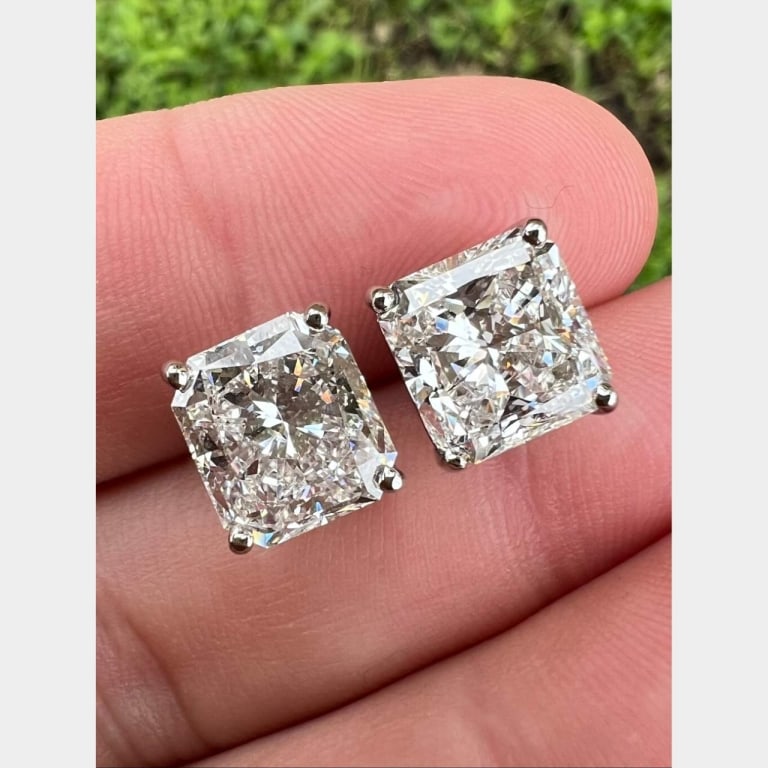 Platinum & 18K GIA Certified 6.10 Ct. Diamond Earr: Item # 8597 Category Earrings Platinum & 18K GIA Certified 6.10 Ct. Diamond Earrings Weighing 6.0 grams Set with a 3.07 Ct. GIA Certified Radiant-cut Diamond F Color, SI2 Clarity 8.86 x 8.06 x 5.37mm