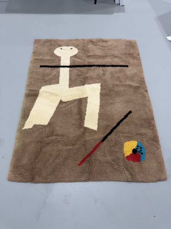 Joan Miró, Le Peintre,1960 Tapestry: Joan Miró, Le Peintre,1960 Tapestry Textile interpretation of Le Peintre (1960), depicting a simplified, biomorphic figure with elongated vertical form intersected by a bold horizontal black line.